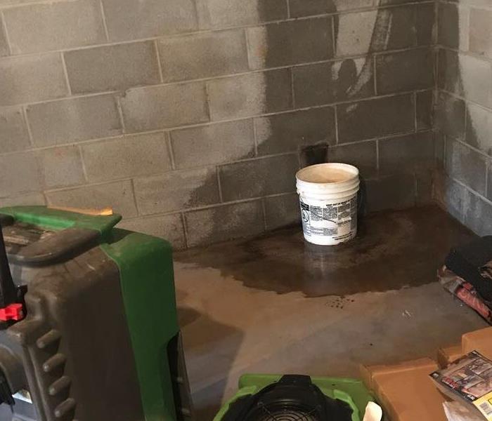 water leak in basement along wall